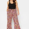 YOURS Curve Pink Floral Print Frill Wide Leg Trousers